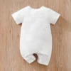 "Barboteuse bébé jungle haut de gamme" (Baby jungle romper of high quality)