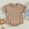 "Romper bébé de qualité, idéal pour l'extérieur" (One-piece baby romper of quality, ideal for outdoors)