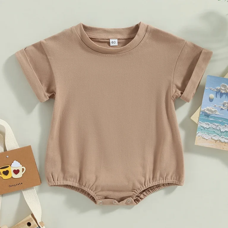 "Romper bébé de qualité, idéal pour l'extérieur" (One-piece baby romper of quality, ideal for outdoors)
