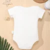 "Barboteuse bébé papa, design coloré et robuste" ( translated : "daddy baby romper, colorful and sturdy design")