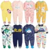 "Onsies bébé colorés et originaux de qualité"(Eight baby onesies with various colors and patterns, high quality)