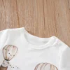 "Barboteuse bébé jungle haut de gamme" (Baby jungle romper of high quality)