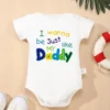 "Barboteuse bébé papa hautement qualitative"(which means "high-quality baby's overall saying 'I want to be like my daddy'")