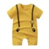 "Barboteuse dinosaure bébé hautement attrayante" (Onesie dinosaur baby highly appealing) or "Barboteuse dinosaure bébé décorative et confortable" (Onesie dinosaur baby decorative and comfortable).